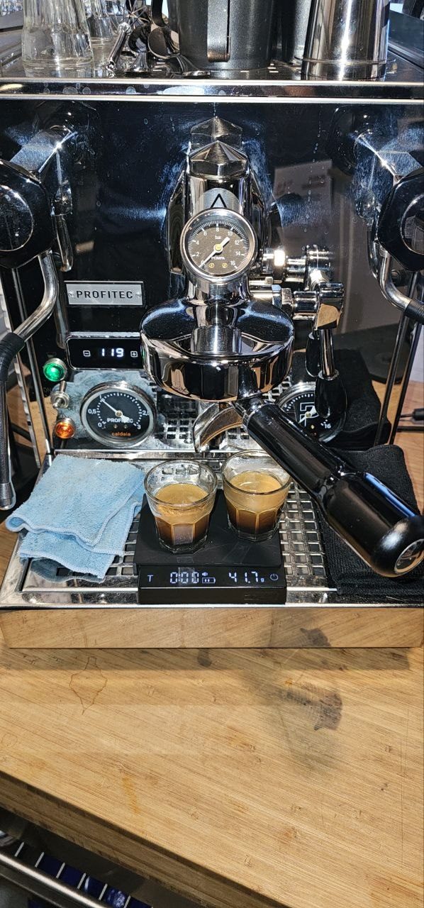 The kiosk counter at B1-K128 with our menu boards and espresso equipment